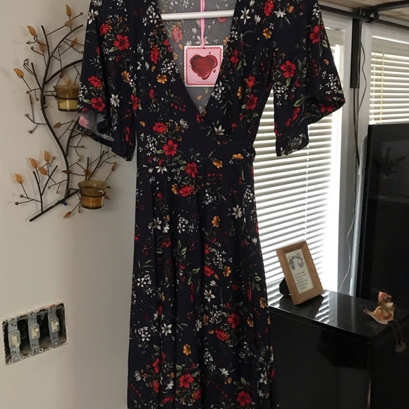2/$10 Brand new with tags wrap dress. - Picture 3 of 3